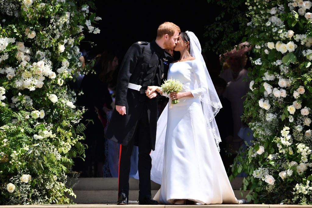 britains-prince-harry-duke-of-sussex-kisses-his-wife-meghan-news-photo-1628532969.jpg