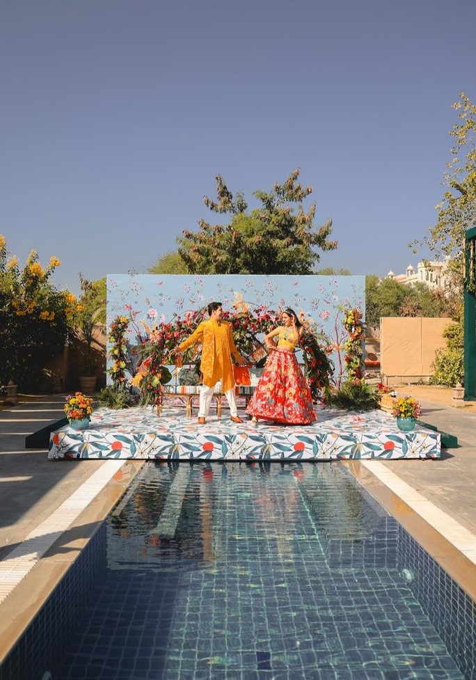 26_Poolside Hadldi Stage Decor in Yellow and Orange Hues.jpg