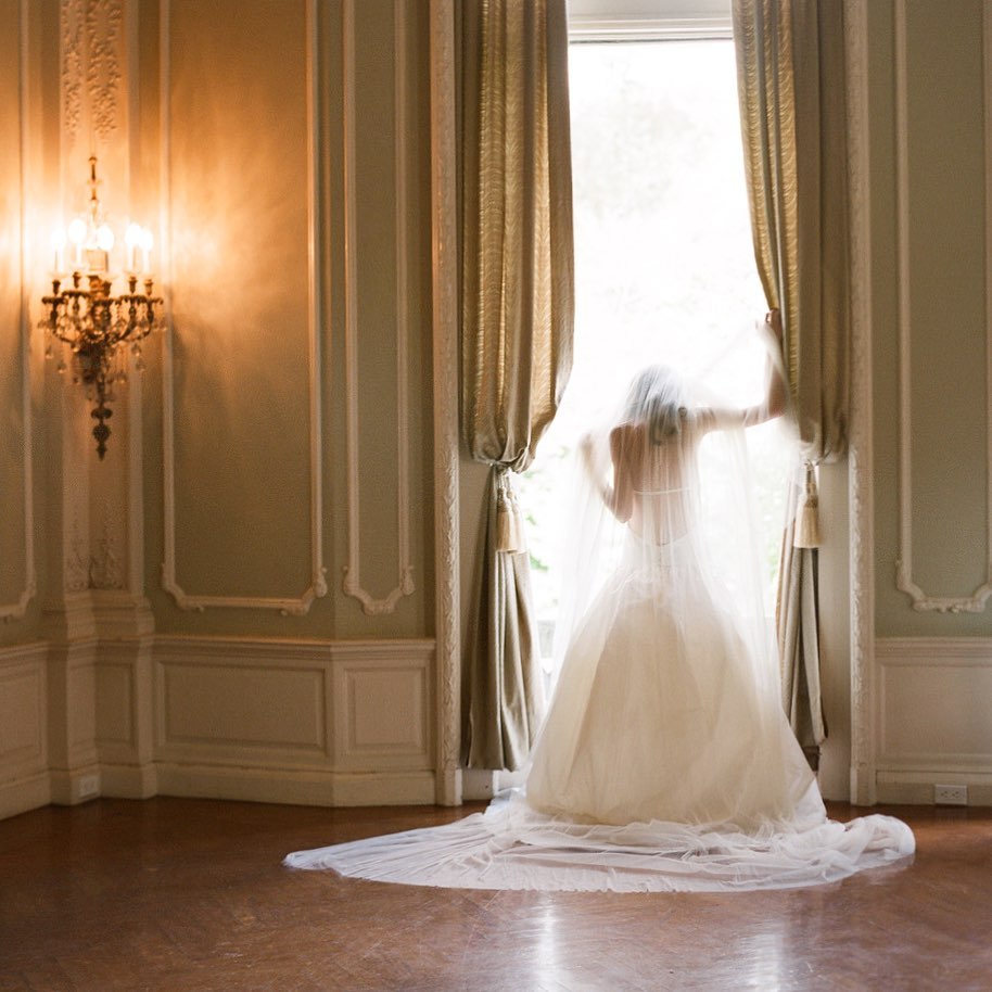 Bridal Pose 5: Opening the curtains