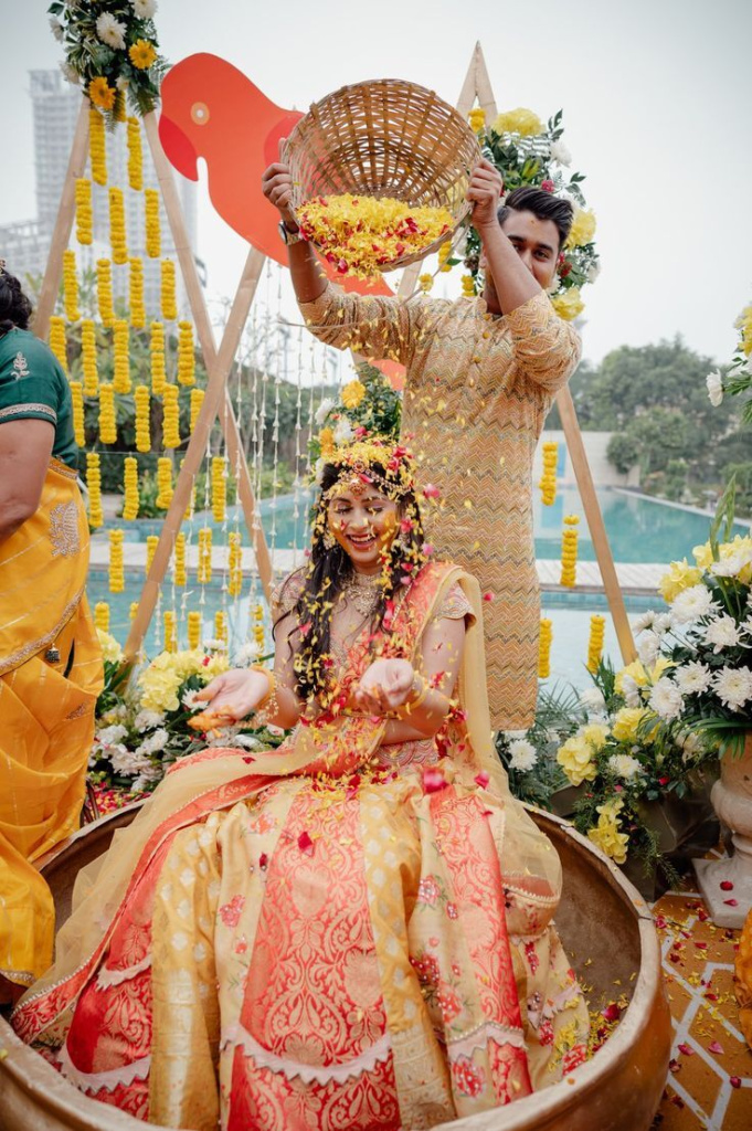 29_indian-bride_-haldi_-haldi-lehenga_-wedding-lehenga_-haldi-decor_-poses-for-wedding-pictures.jpg