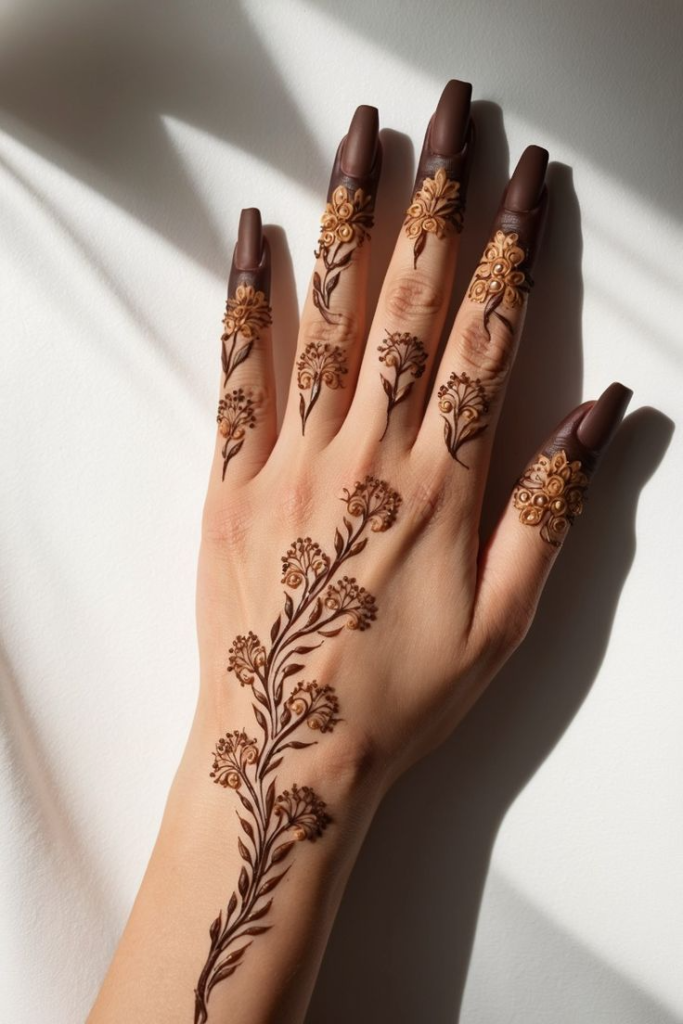 7_Floral Vine Mehndi_ Delicate Blooms with Intricate Finger Details.jpg