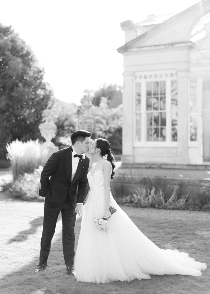 6_chloe-winstanley-weddings-syon-park-elie-saab-kiss.jpg