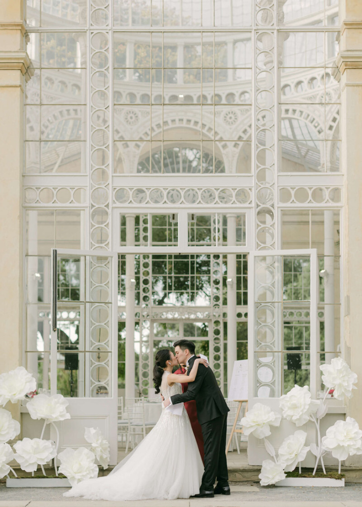 10_chloe-winstanley-weddings-syon-park-conservatory-ceremony-first-kiss.jpg