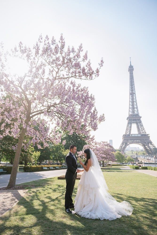 33_'Bride and groom exchanging vows in Paris by the Eiffel Tower.jpg