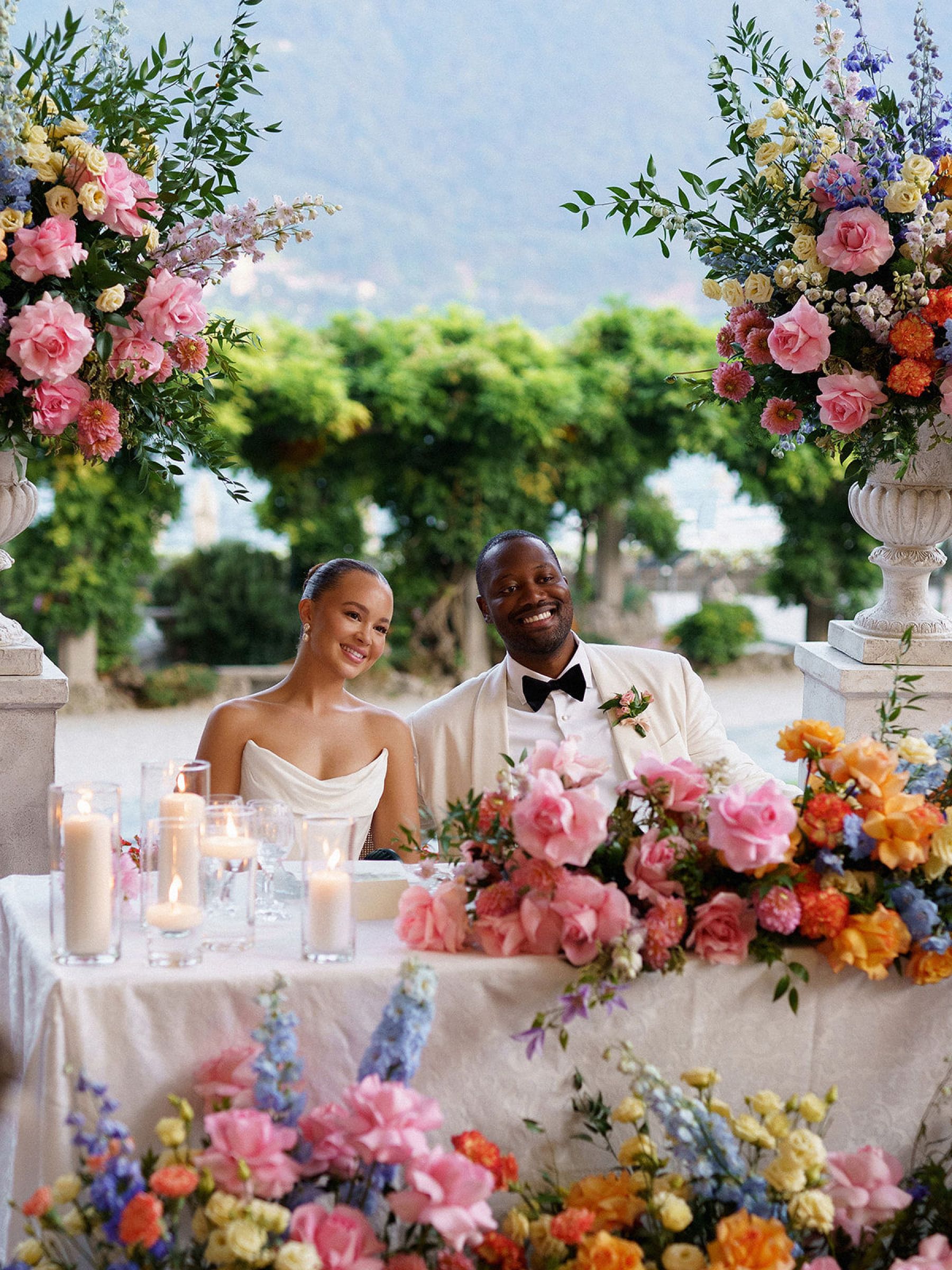 Madison &amp; Rotimi's Wedding at Villa D'Este: One Wooden Boat, 125 Guests, and Florals Nobody Expected photo