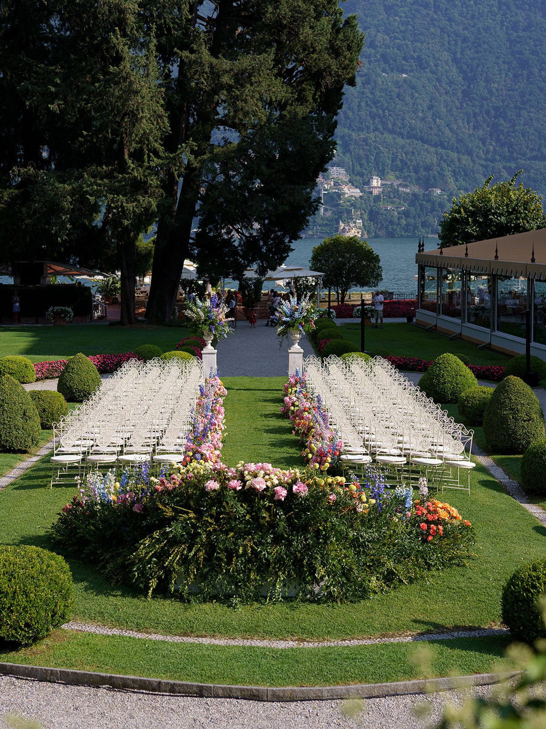 Madison &amp; Rotimi's Wedding at Villa D'Este: One Wooden Boat, 125 Guests, and Florals Nobody Expected photo