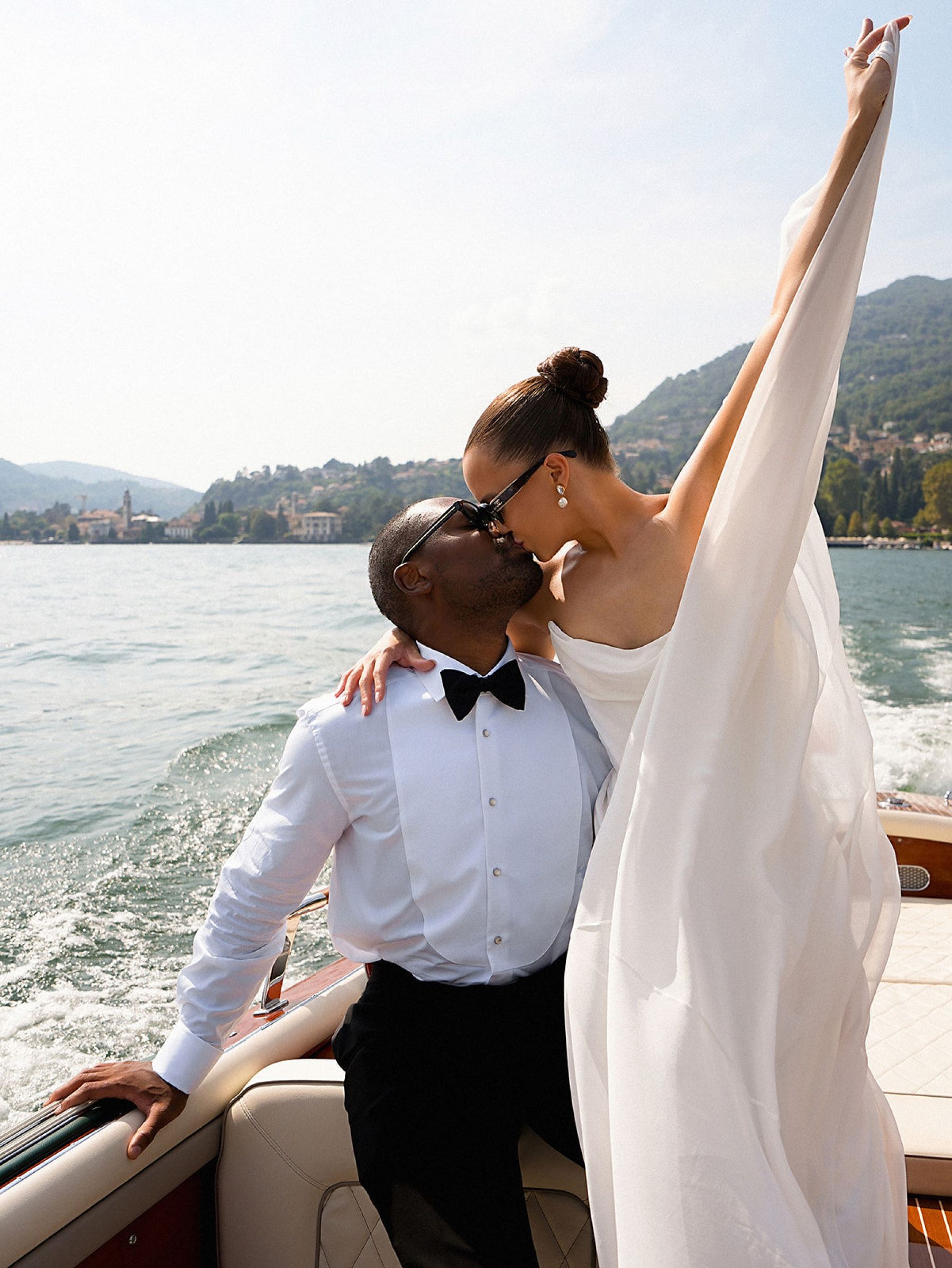 Madison &amp; Rotimi's Wedding at Villa D'Este: One Wooden Boat, 125 Guests, and Florals Nobody Expected photo