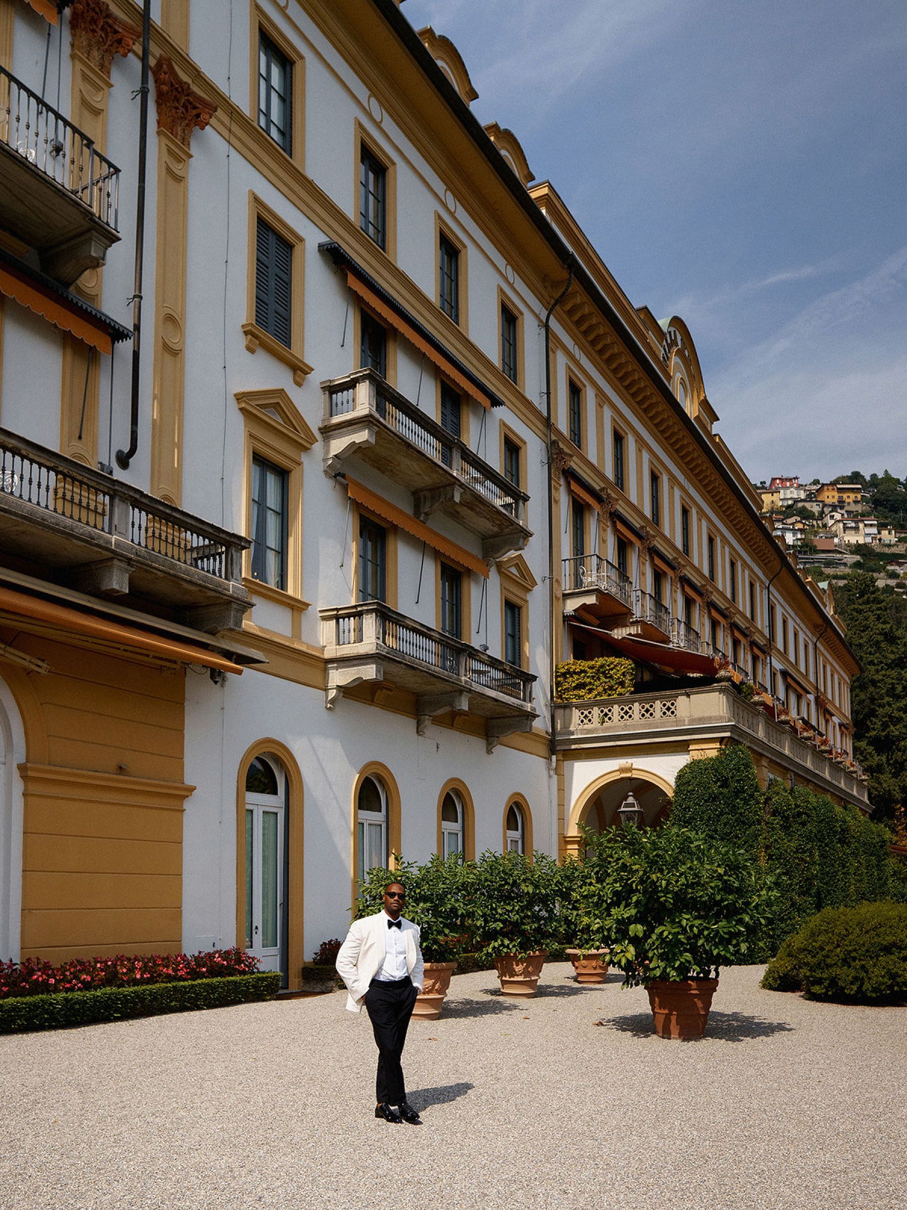 Madison &amp; Rotimi's Wedding at Villa D'Este: One Wooden Boat, 125 Guests, and Florals Nobody Expected photo