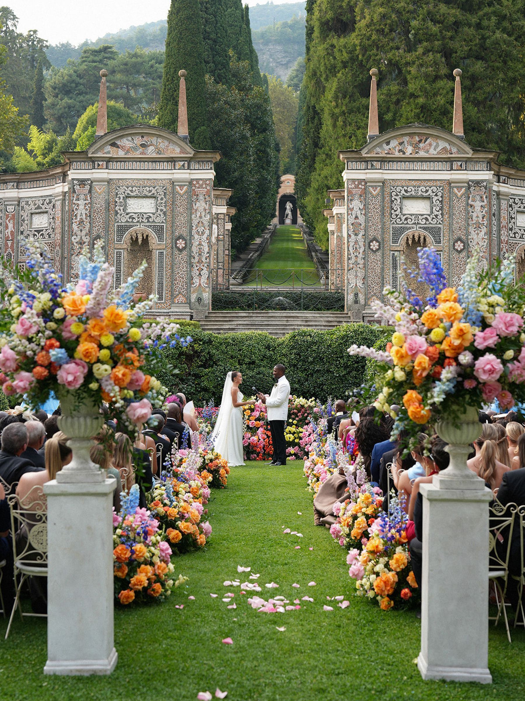 Madison &amp; Rotimi's Wedding at Villa D'Este: One Wooden Boat, 125 Guests, and Florals Nobody Expected photo