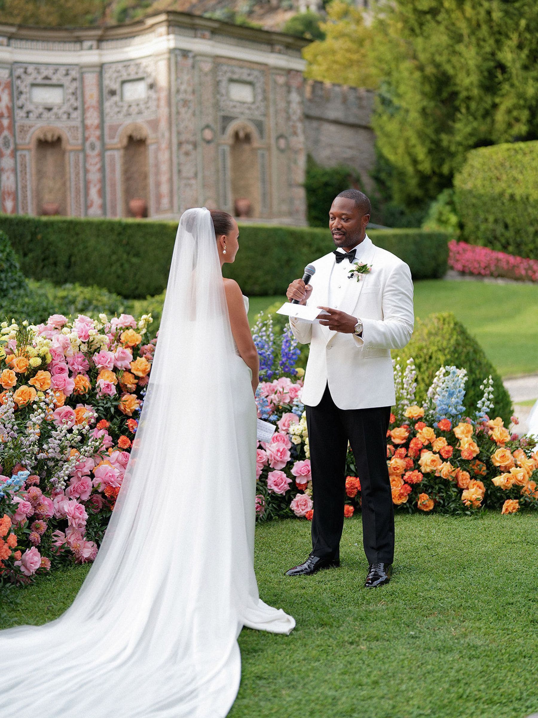 Madison &amp; Rotimi's Wedding at Villa D'Este: One Wooden Boat, 125 Guests, and Florals Nobody Expected photo