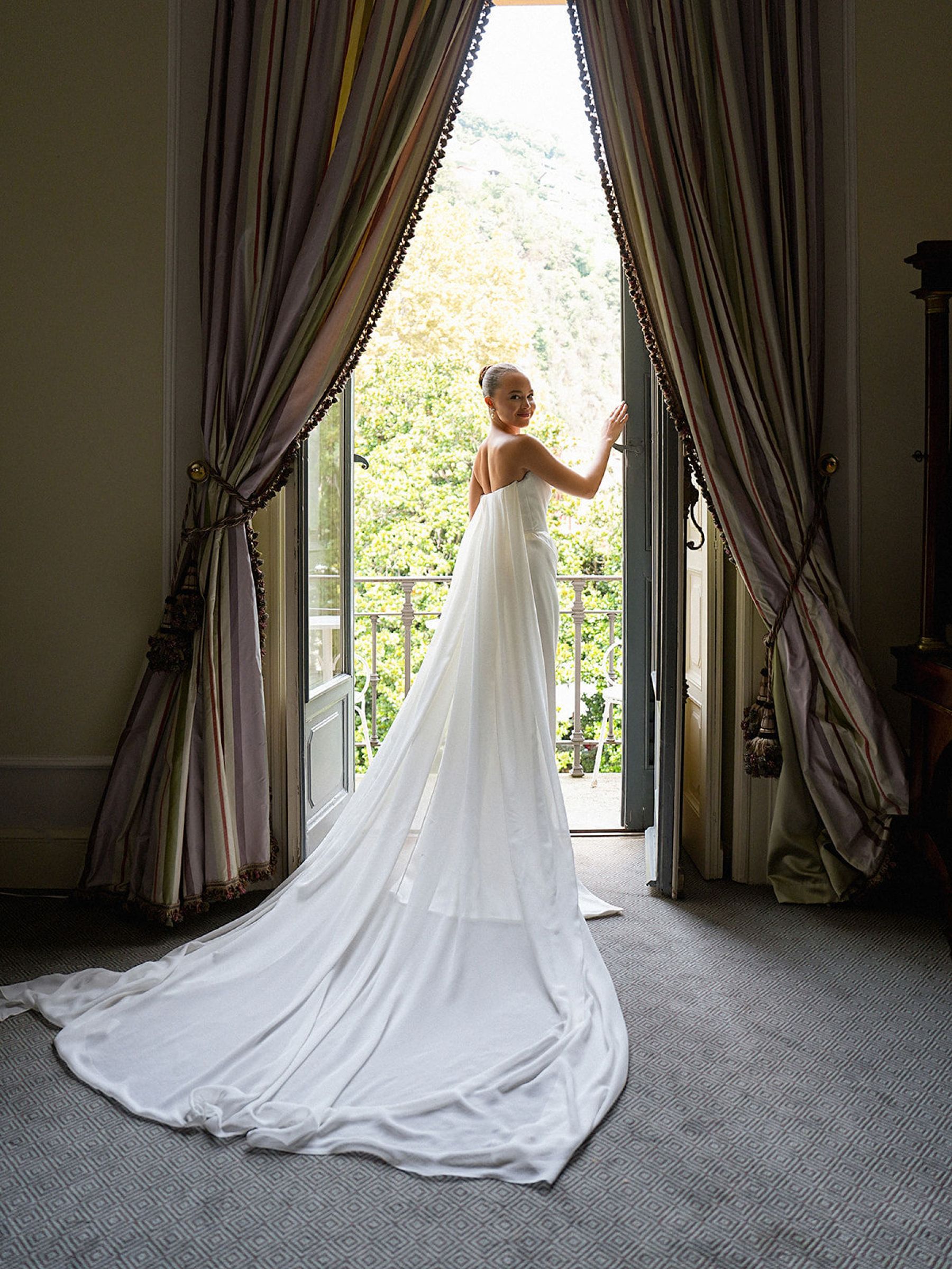 Madison &amp; Rotimi's Wedding at Villa D'Este: One Wooden Boat, 125 Guests, and Florals Nobody Expected photo
