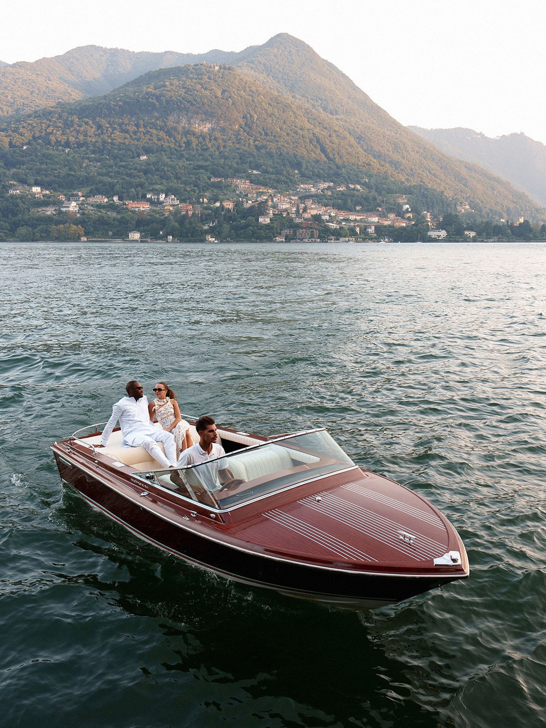 Madison &amp; Rotimi's Wedding at Villa D'Este: One Wooden Boat, 125 Guests, and Florals Nobody Expected photo