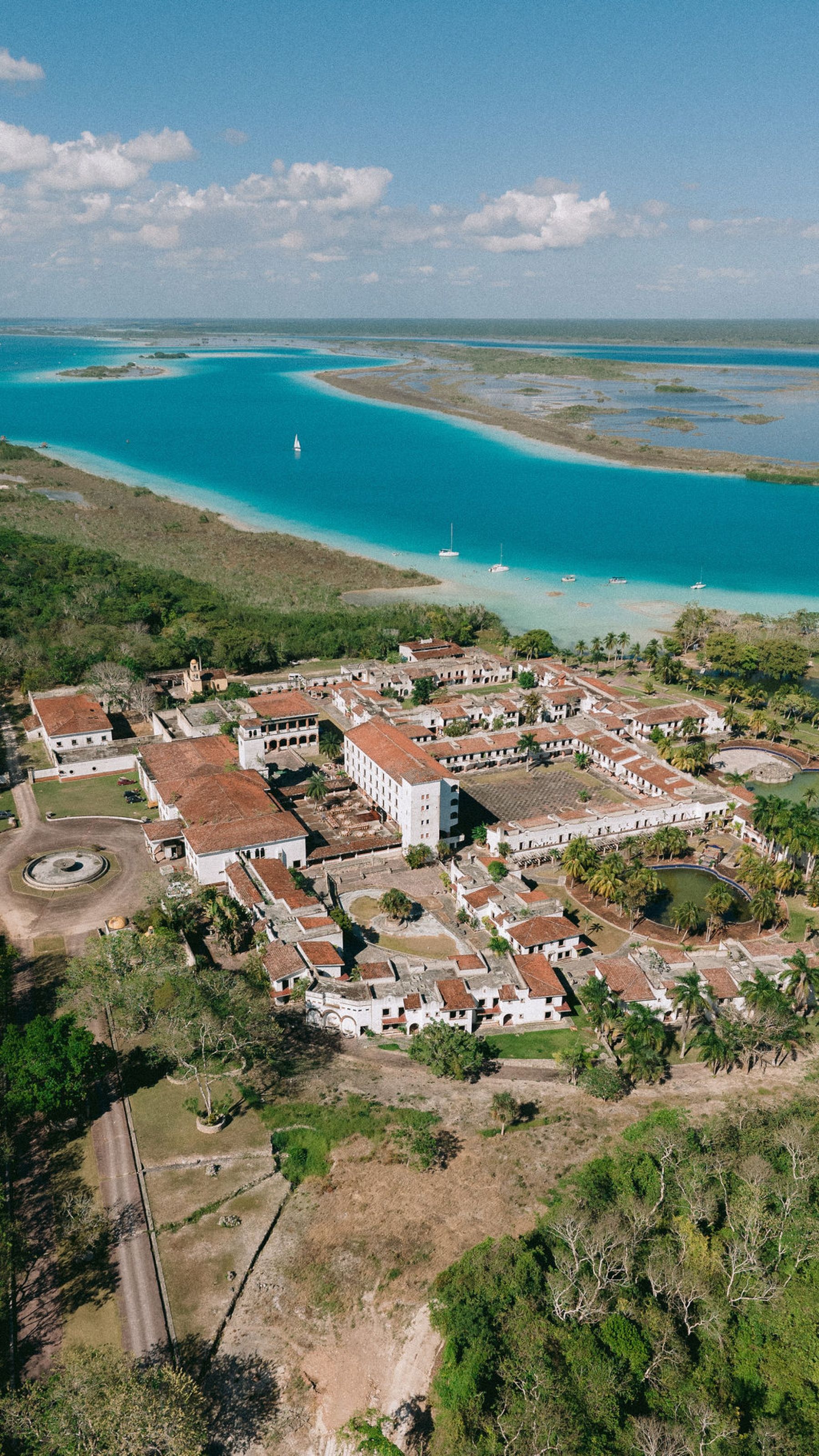 Thirteen Nationalities, a Shaman, and Seven Shades of Blue: Pauline &amp; Marsilio's Wedding at Bacalaria in Bacalar photo