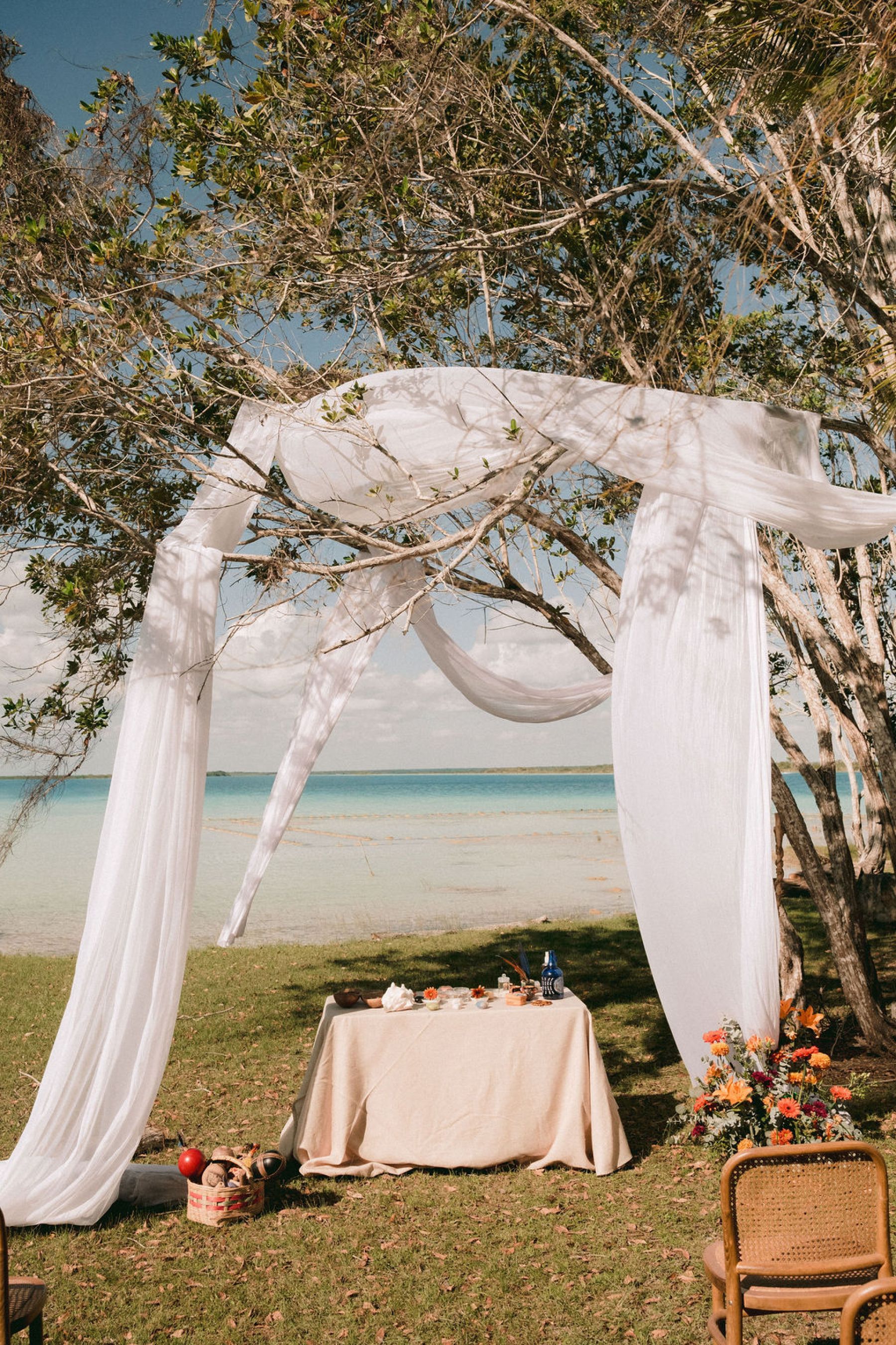 Thirteen Nationalities, a Shaman, and Seven Shades of Blue: Pauline &amp; Marsilio's Wedding at Bacalaria in Bacalar photo