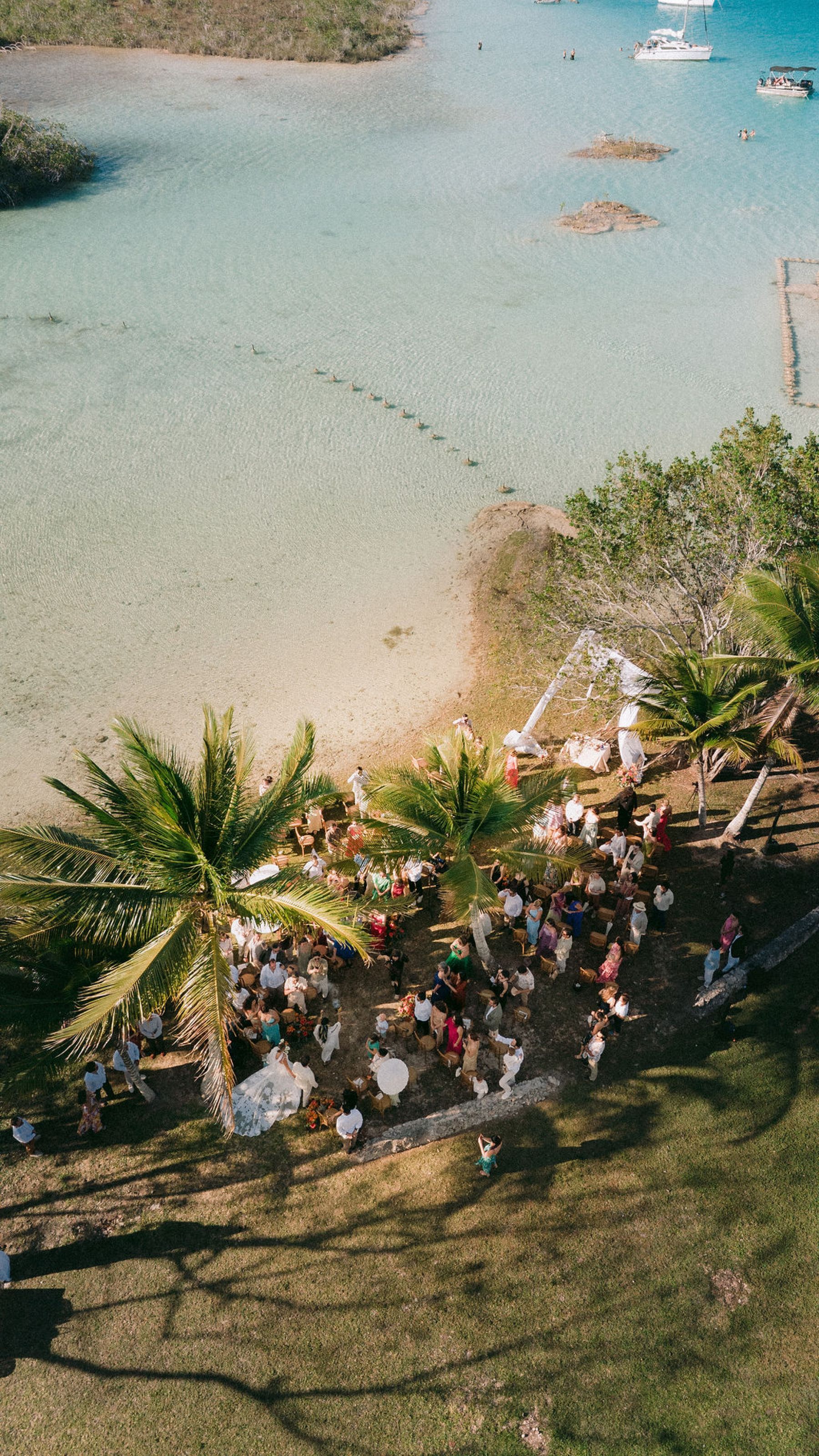 Thirteen Nationalities, a Shaman, and Seven Shades of Blue: Pauline &amp; Marsilio's Wedding at Bacalaria in Bacalar photo