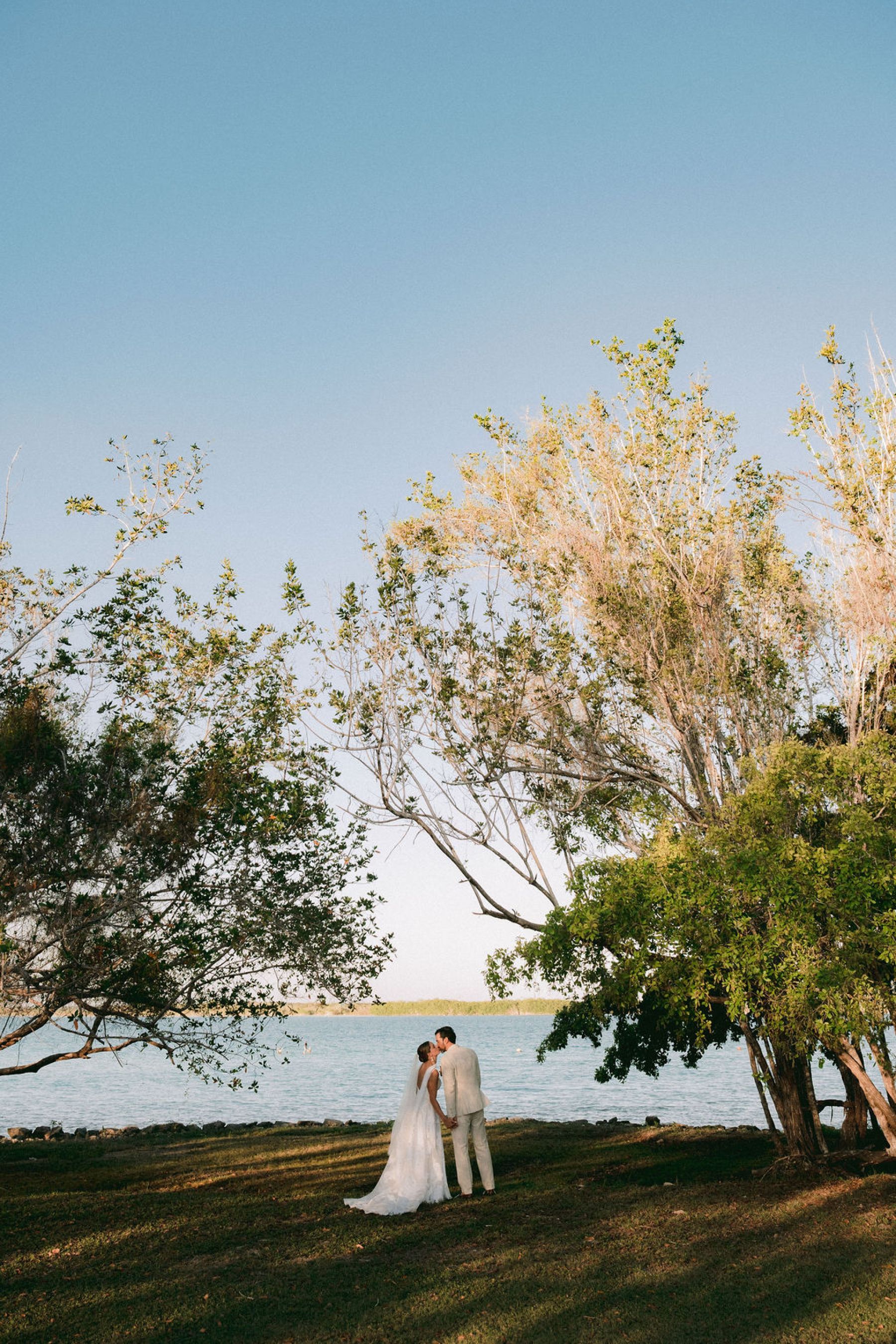 Thirteen Nationalities, a Shaman, and Seven Shades of Blue: Pauline &amp; Marsilio's Wedding at Bacalaria in Bacalar photo