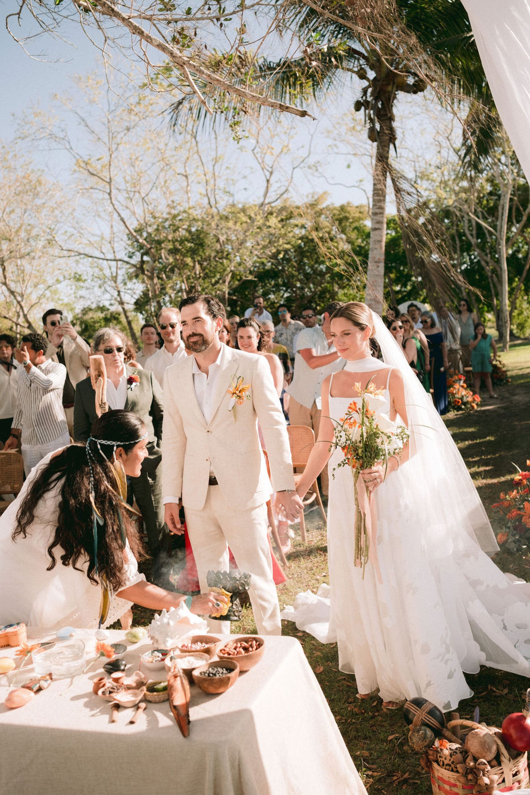 Thirteen Nationalities, a Shaman, and Seven Shades of Blue: Pauline &amp; Marsilio's Wedding at Bacalaria in Bacalar photo