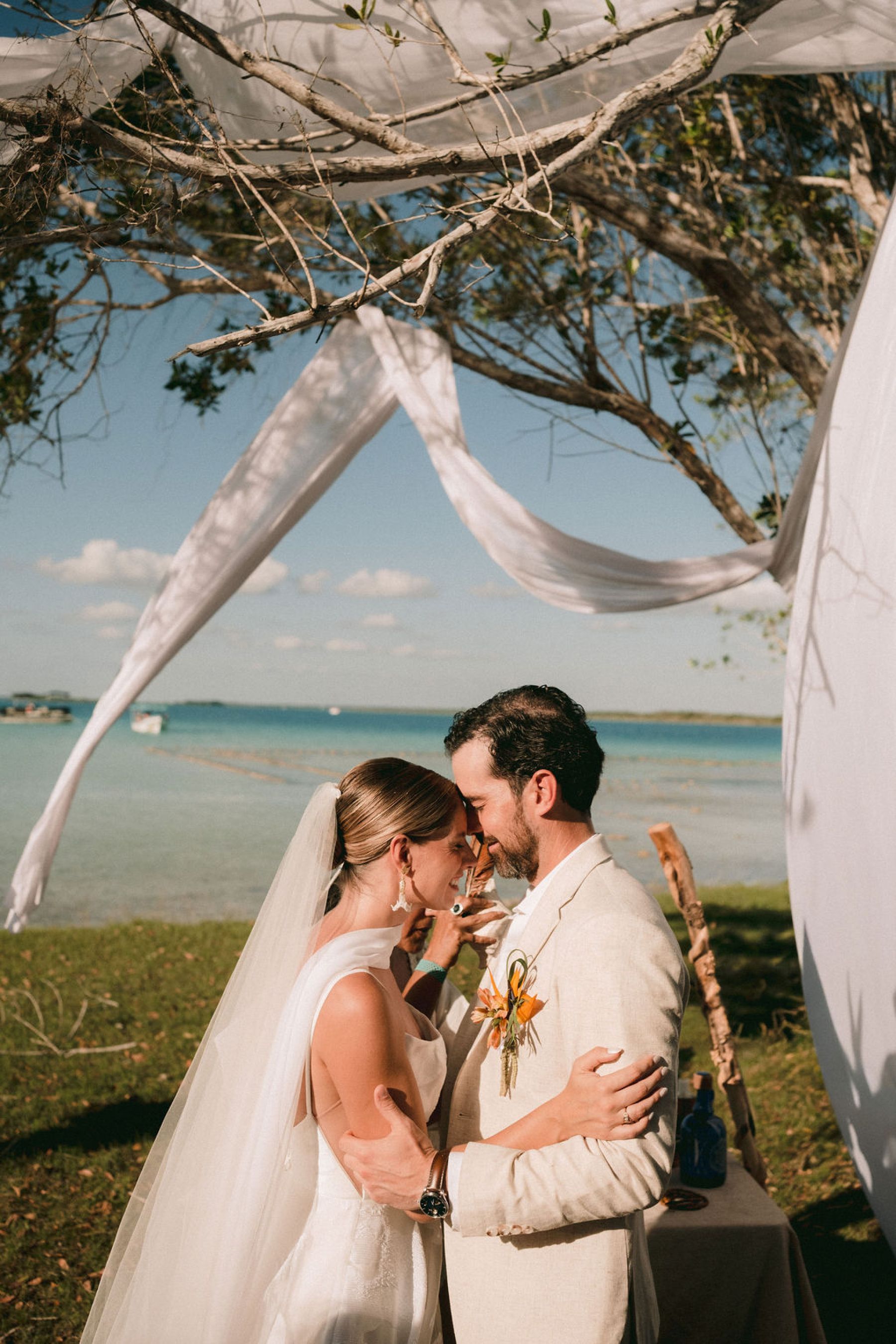 Thirteen Nationalities, a Shaman, and Seven Shades of Blue: Pauline &amp; Marsilio's Wedding at Bacalaria in Bacalar photo