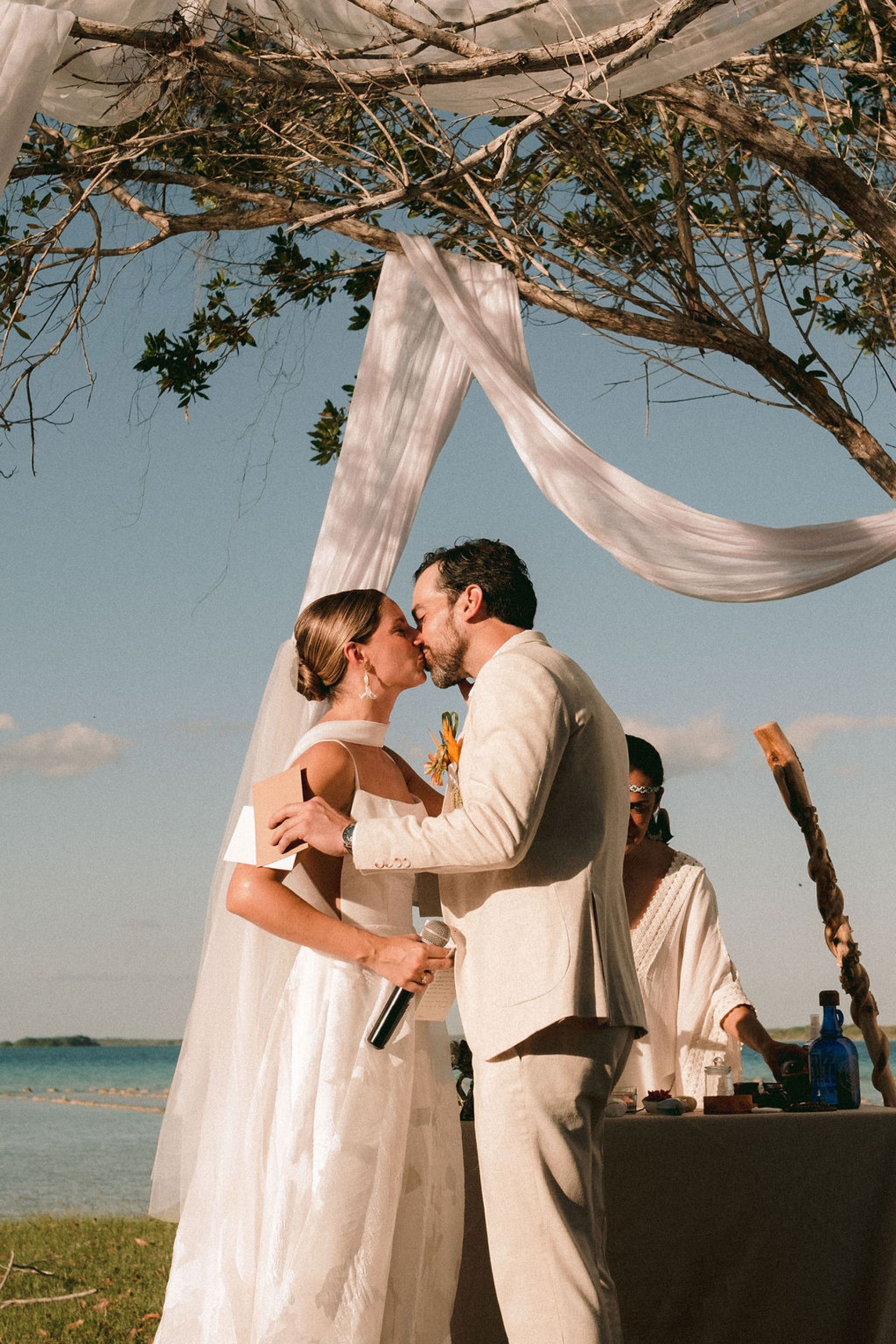 Thirteen Nationalities, a Shaman, and Seven Shades of Blue: Pauline &amp; Marsilio's Wedding at Bacalaria in Bacalar photo