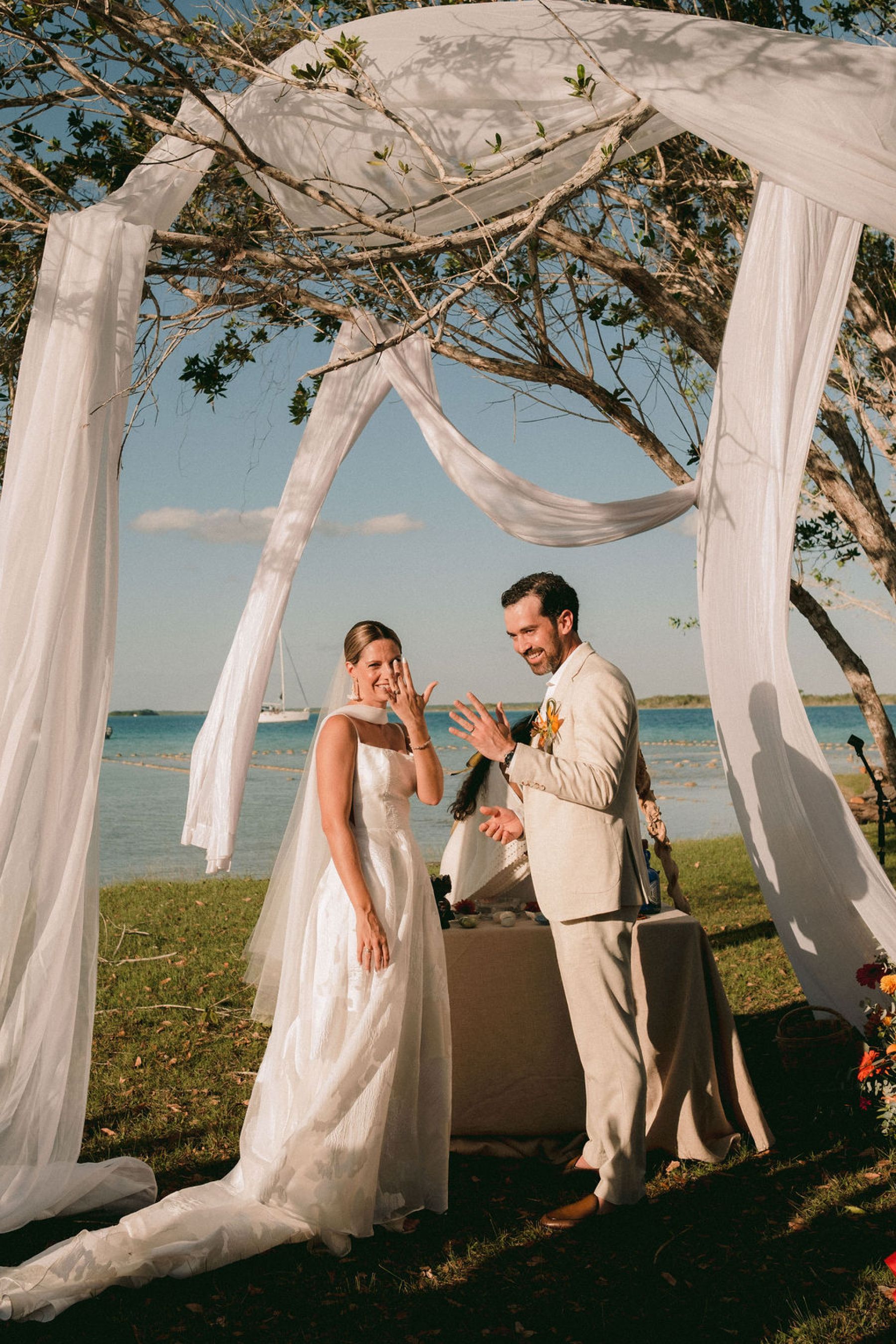 Thirteen Nationalities, a Shaman, and Seven Shades of Blue: Pauline &amp; Marsilio's Wedding at Bacalaria in Bacalar photo