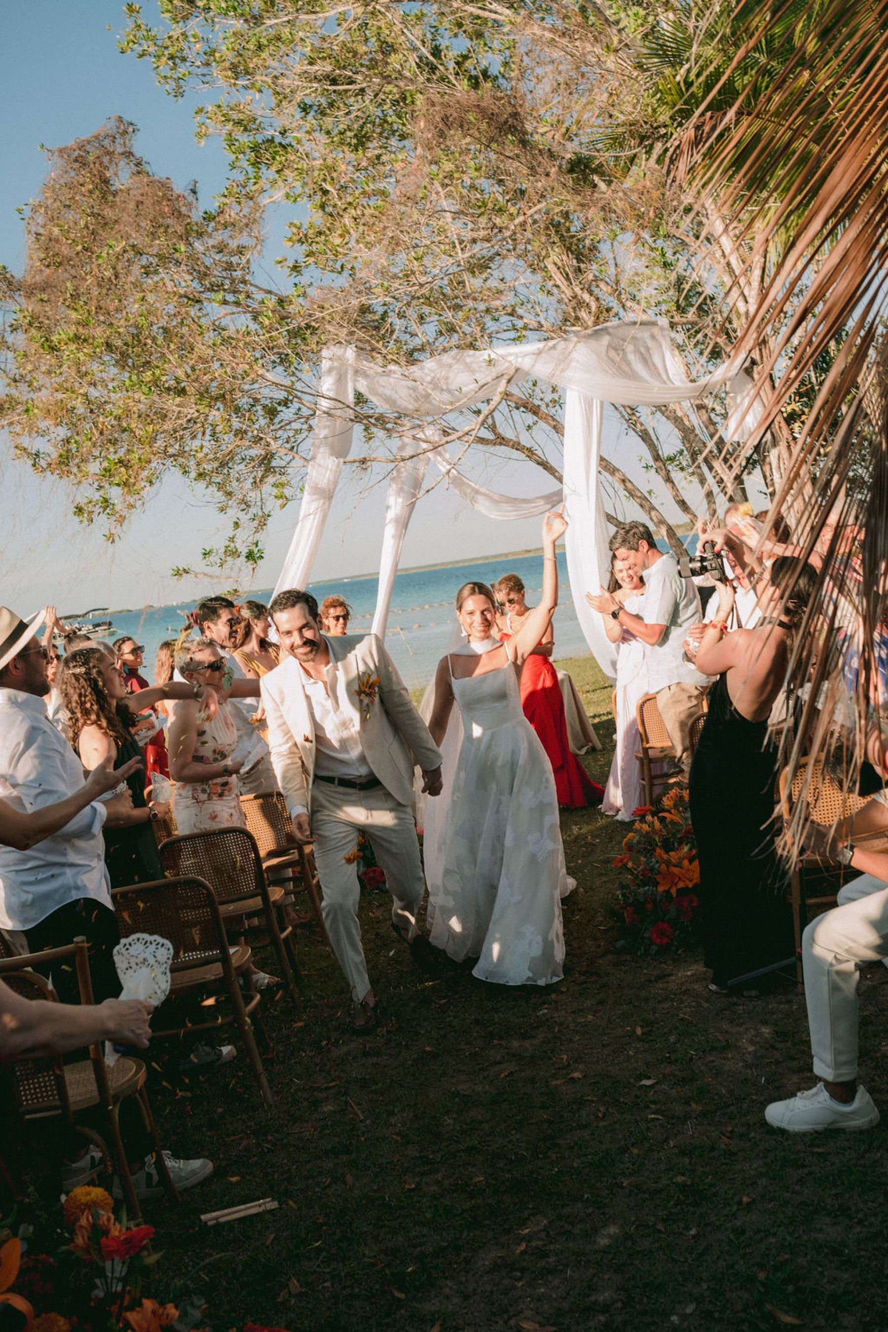 Thirteen Nationalities, a Shaman, and Seven Shades of Blue: Pauline &amp; Marsilio's Wedding at Bacalaria in Bacalar photo