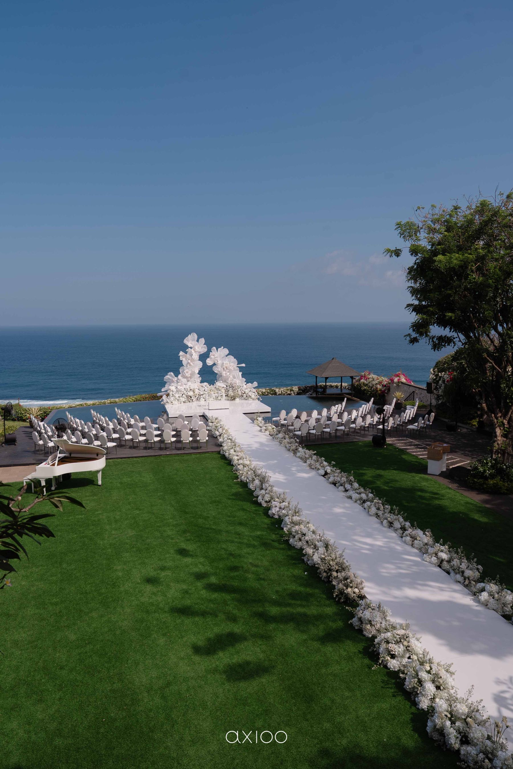 A Floating Stage, Paragliders Overhead and 100 Guests Who Flew Across the World: Karen &amp; Joey's Wedding at Pandawa Cliff Estate photo