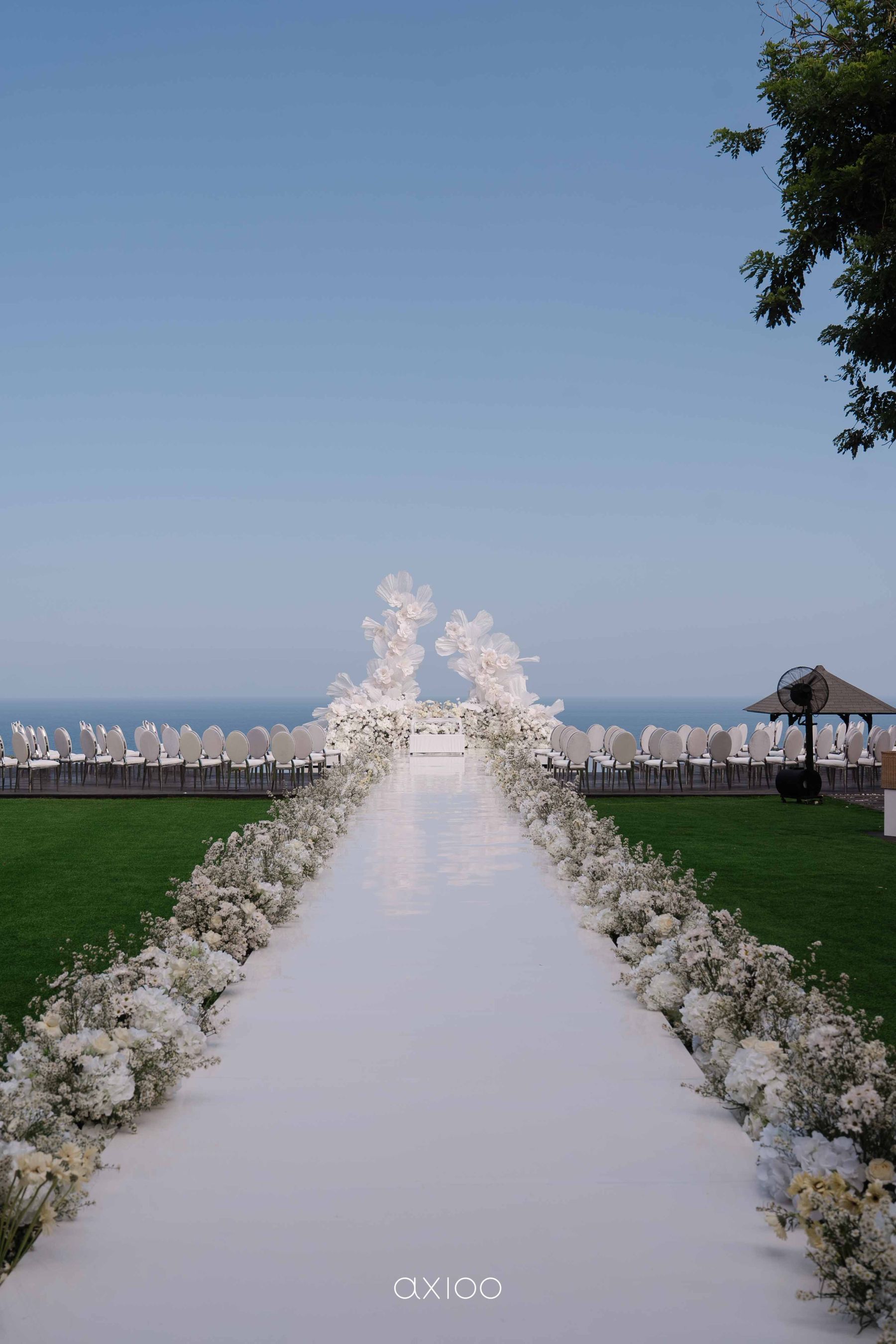 A Floating Stage, Paragliders Overhead and 100 Guests Who Flew Across the World: Karen &amp; Joey's Wedding at Pandawa Cliff Estate photo
