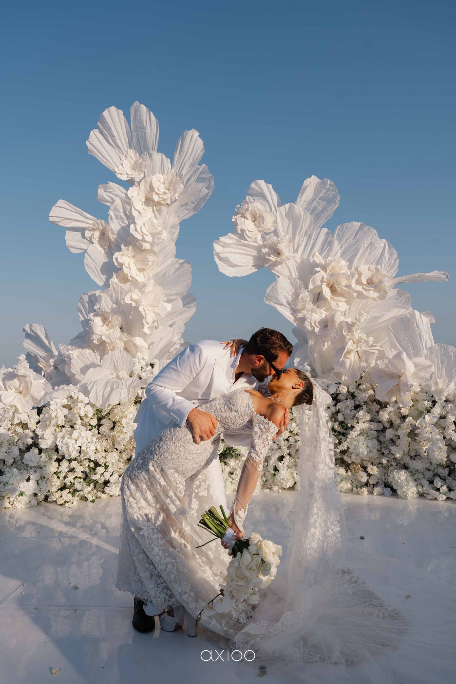 A Floating Stage, Paragliders Overhead and 100 Guests Who Flew Across the World: Karen &amp; Joey's Wedding at Pandawa Cliff Estate photo