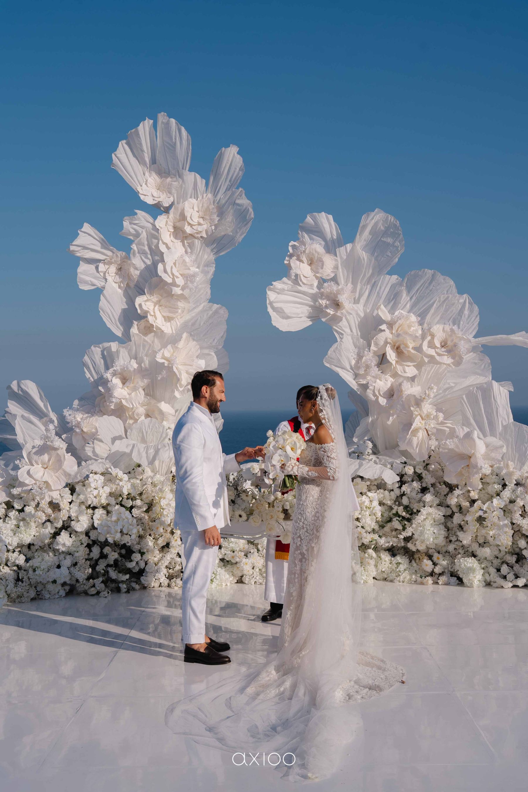 A Floating Stage, Paragliders Overhead and 100 Guests Who Flew Across the World: Karen &amp; Joey's Wedding at Pandawa Cliff Estate photo