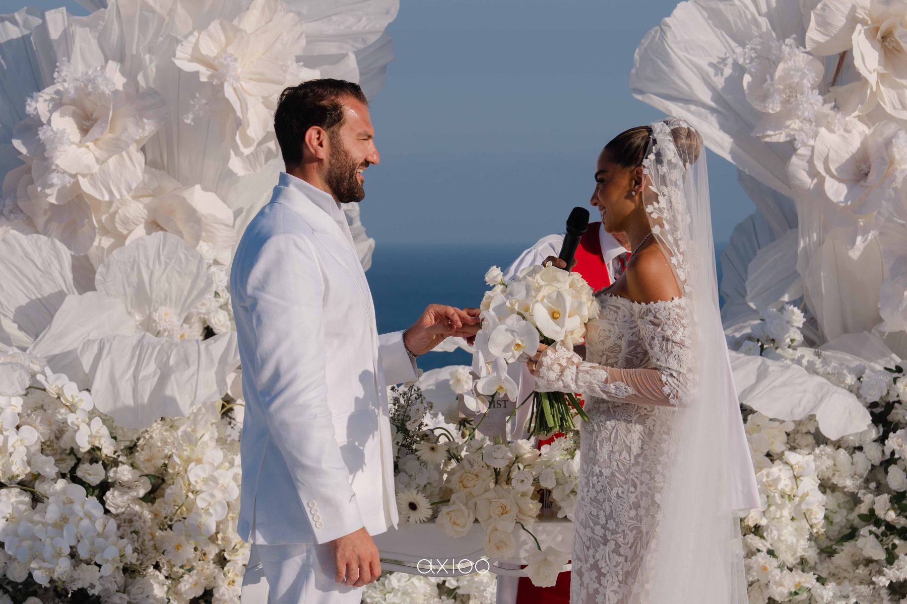A Floating Stage, Paragliders Overhead and 100 Guests Who Flew Across the World: Karen &amp; Joey's Wedding at Pandawa Cliff Estate photo