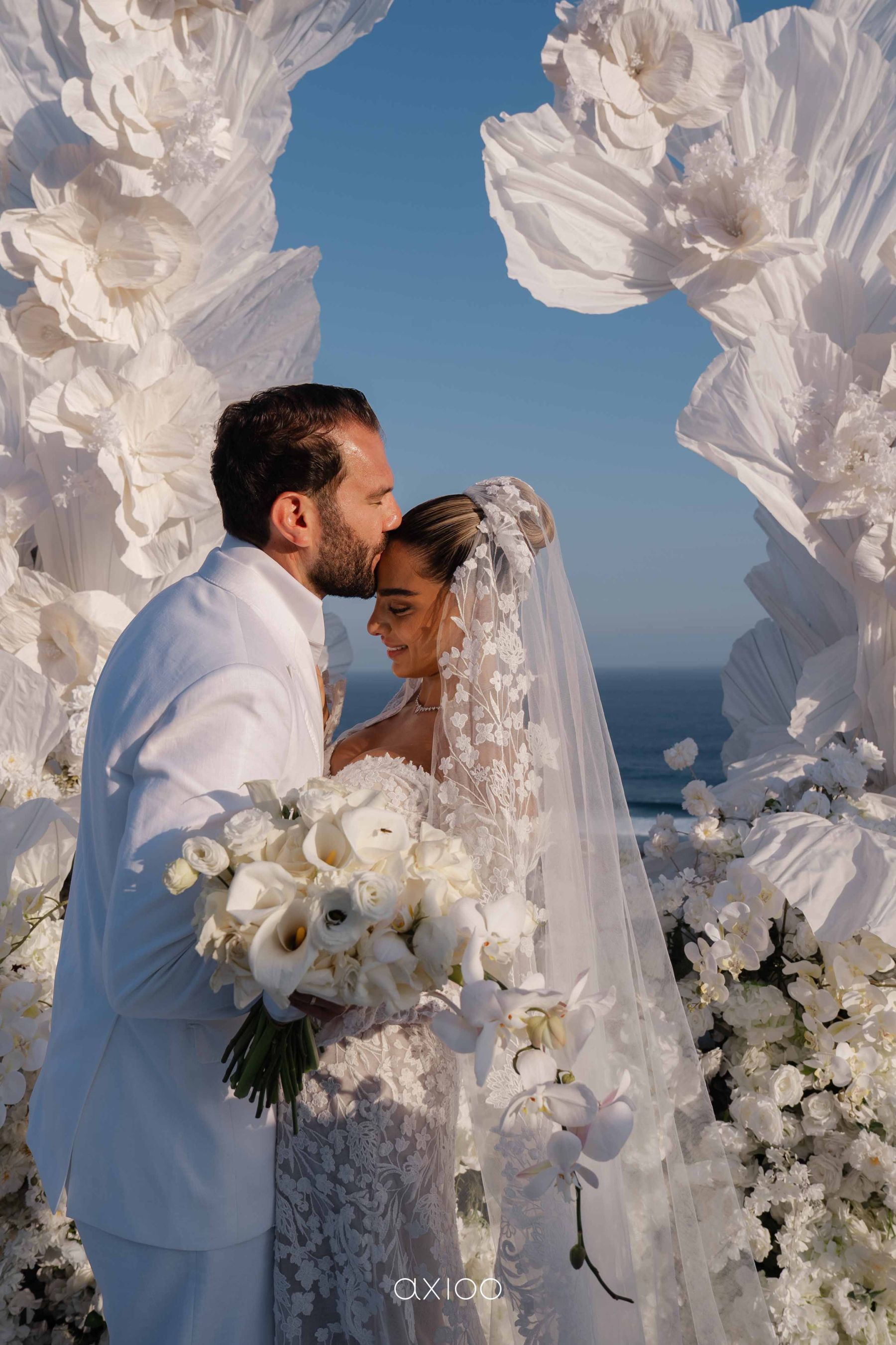 A Floating Stage, Paragliders Overhead and 100 Guests Who Flew Across the World: Karen &amp; Joey's Wedding at Pandawa Cliff Estate photo