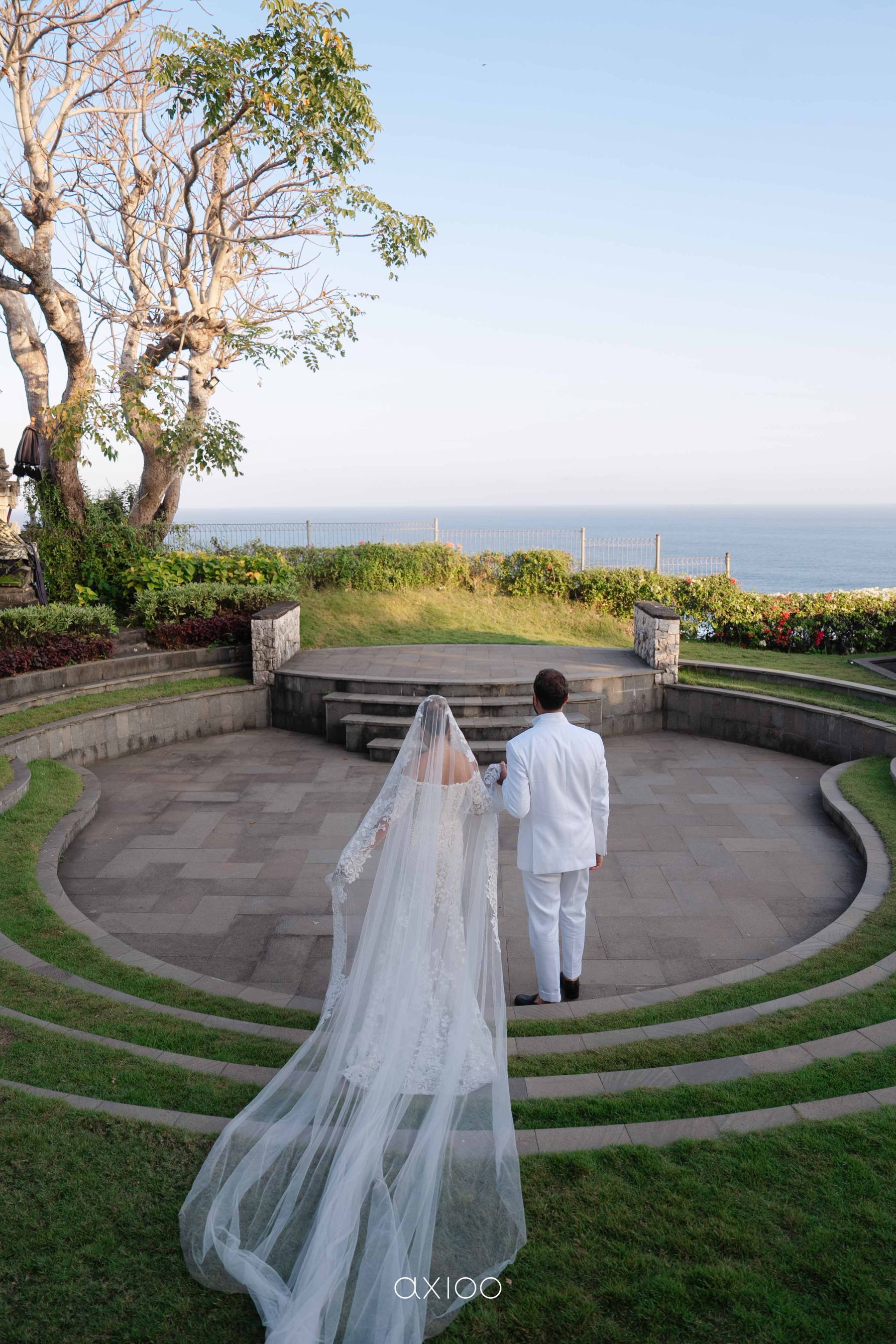A Floating Stage, Paragliders Overhead and 100 Guests Who Flew Across the World: Karen &amp; Joey's Wedding at Pandawa Cliff Estate photo
