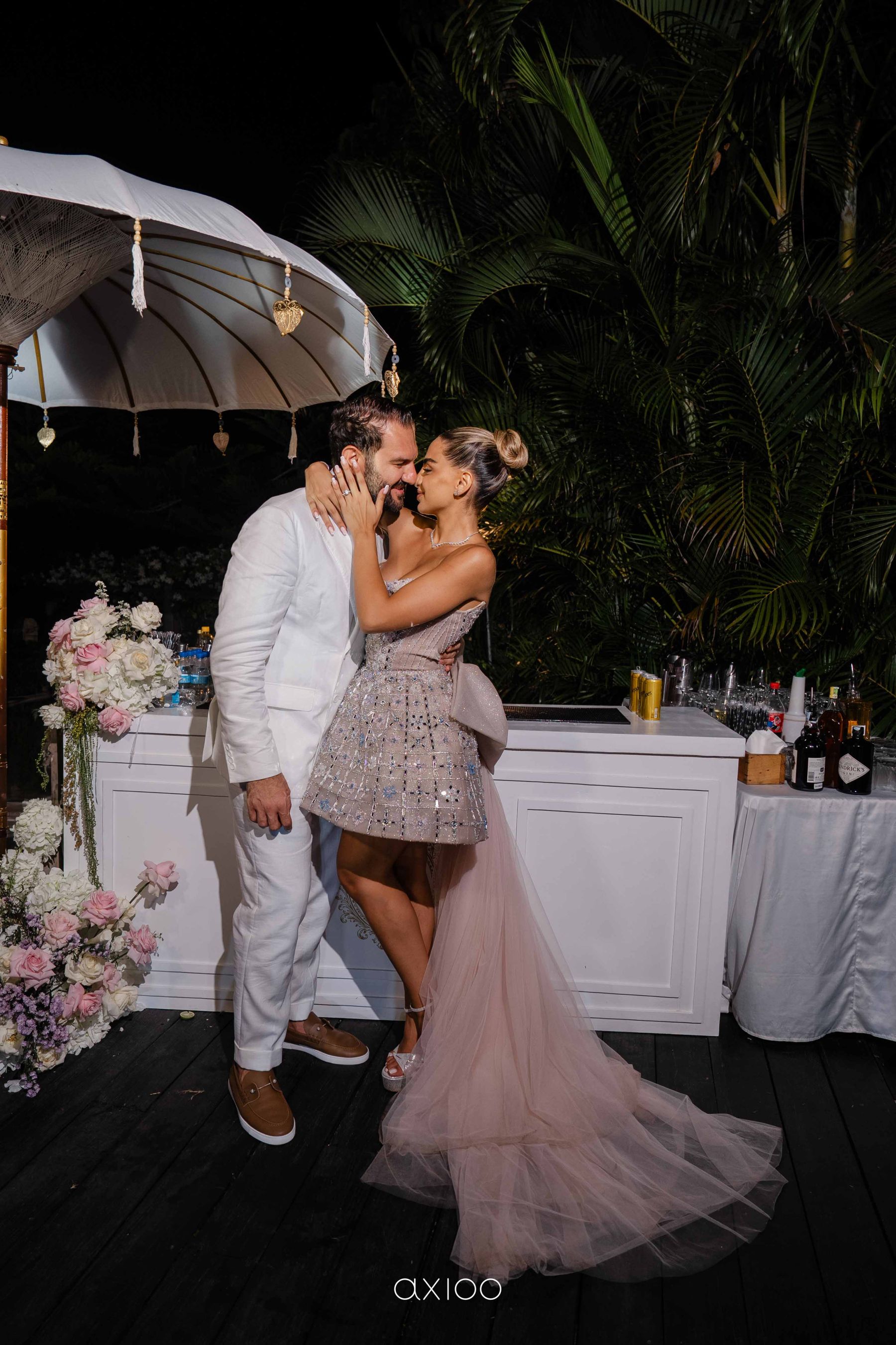 A Floating Stage, Paragliders Overhead and 100 Guests Who Flew Across the World: Karen &amp; Joey's Wedding at Pandawa Cliff Estate photo
