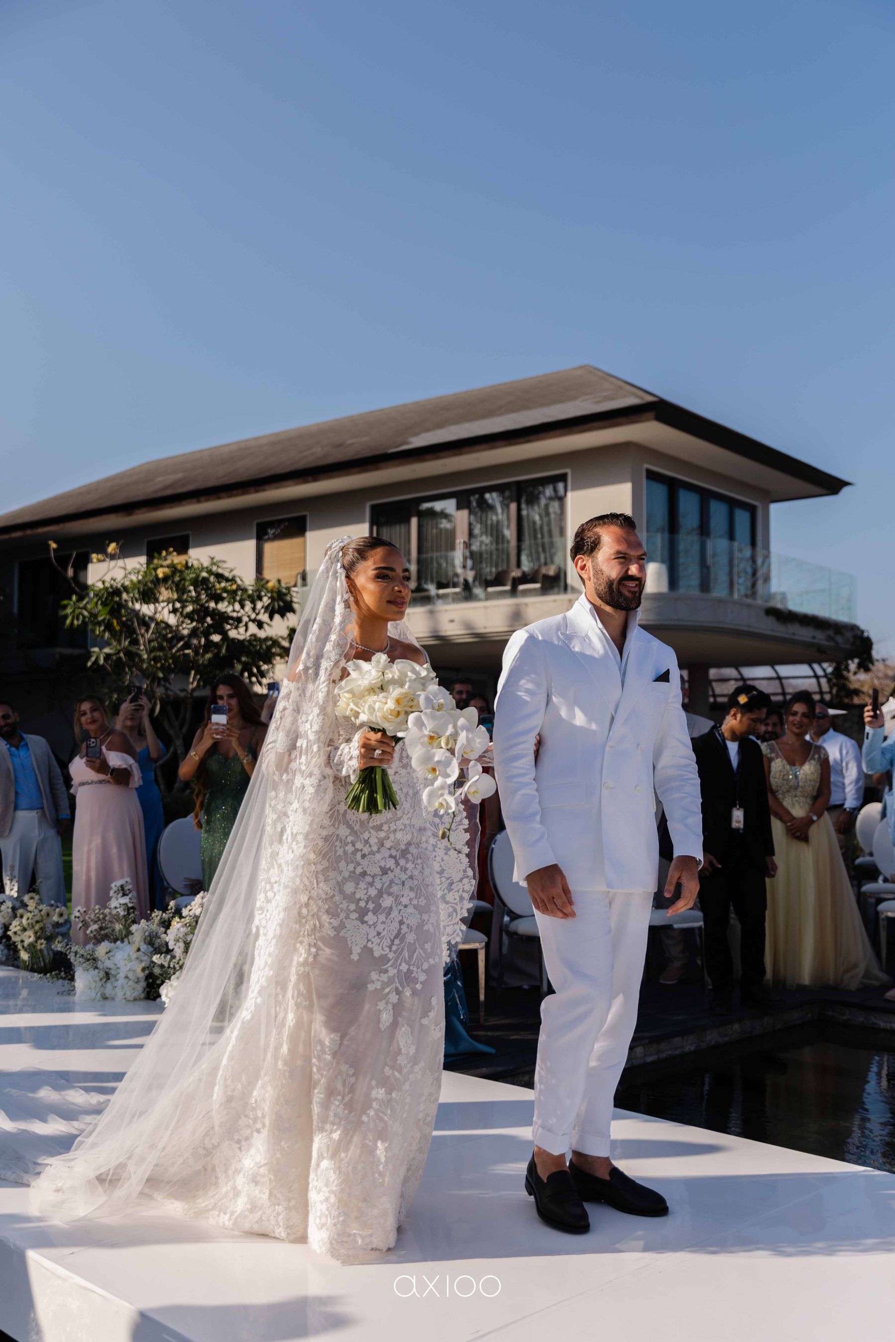 A Floating Stage, Paragliders Overhead and 100 Guests Who Flew Across the World: Karen &amp; Joey's Wedding at Pandawa Cliff Estate photo