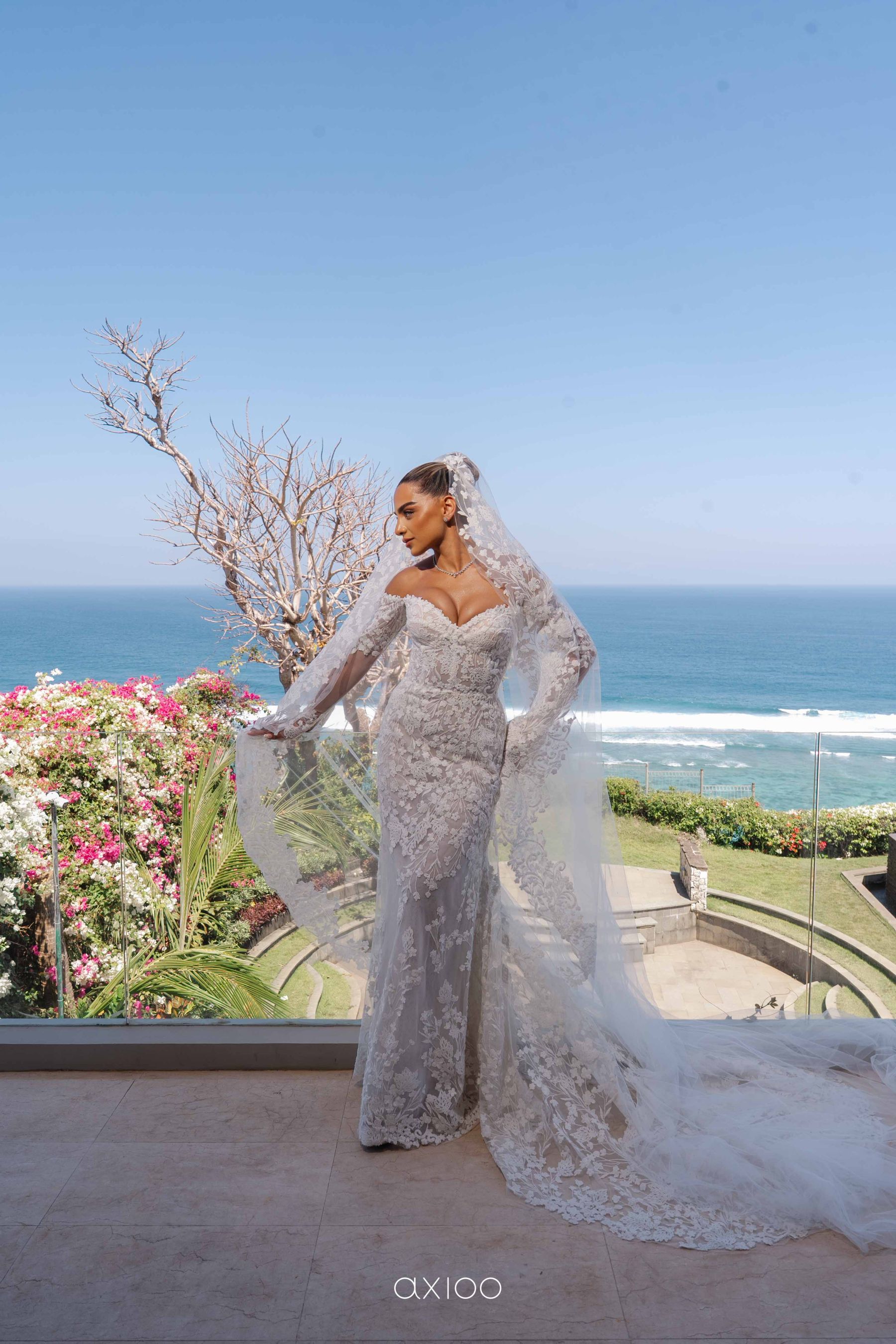 A Floating Stage, Paragliders Overhead and 100 Guests Who Flew Across the World: Karen &amp; Joey's Wedding at Pandawa Cliff Estate photo